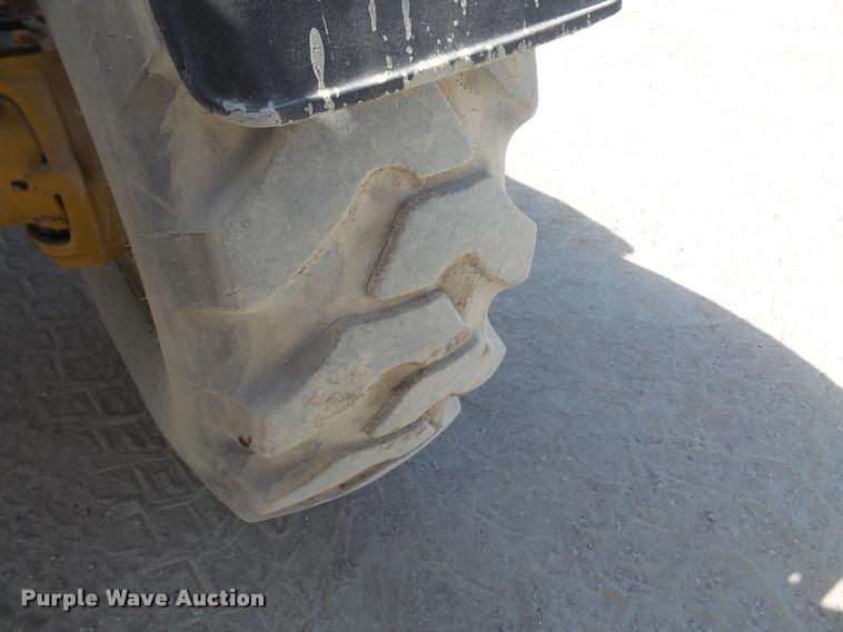 image for item K3709 1999 Caterpillar TH103 telehandler