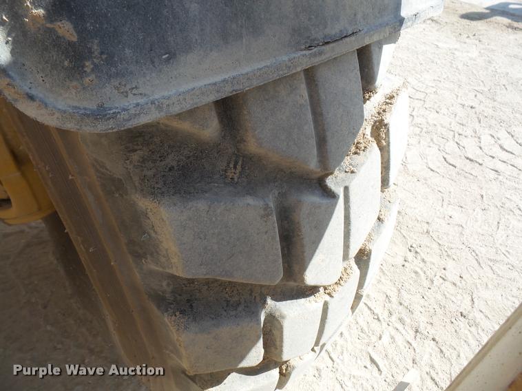 image for item K3709 1999 Caterpillar TH103 telehandler