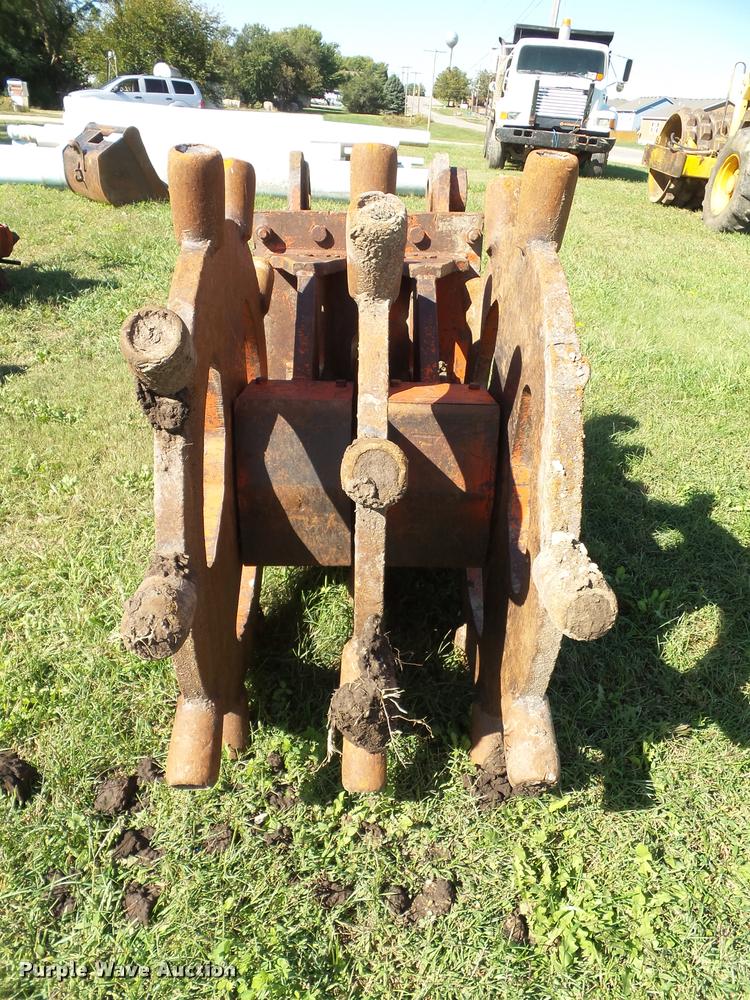 image for item K8171 Barone excavator wedge/spike roller attachment