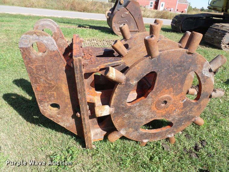 image for item K8171 Barone excavator wedge/spike roller attachment