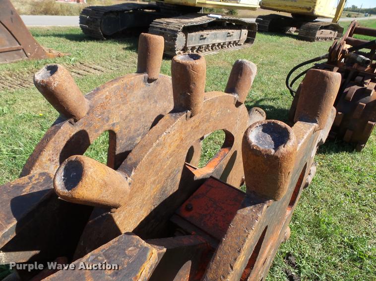 image for item K8171 Barone excavator wedge/spike roller attachment