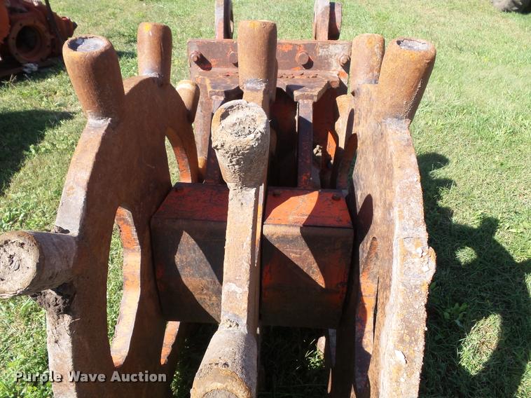 image for item K8171 Barone excavator wedge/spike roller attachment