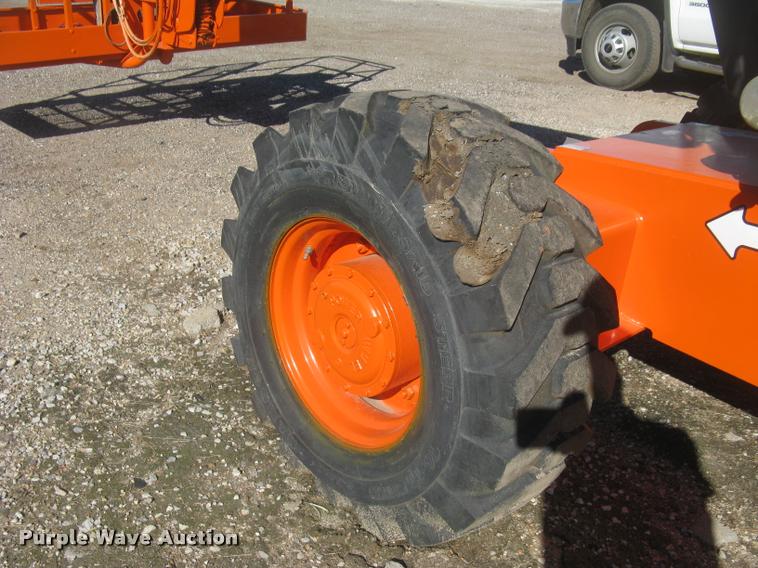 image for item L3891 1999 JLG 600A boom lift