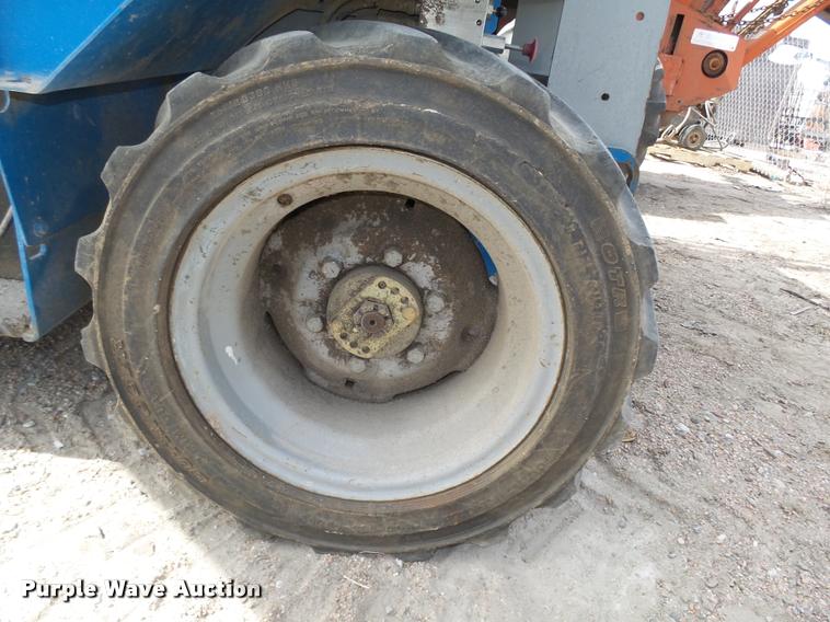 image for item L4066 2002 Genie GS-3268 scissor lift