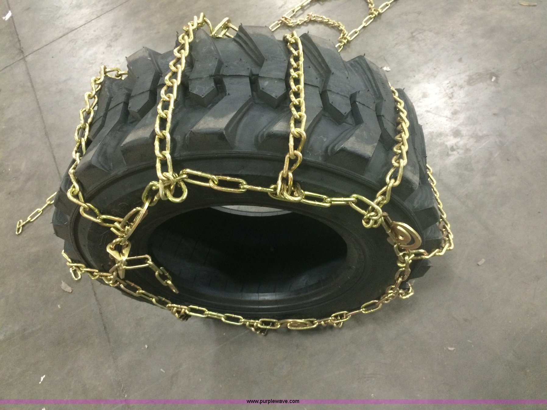 (4) Case 12x16.5 hardened skid steer tire chains in Tonganoxie, KS