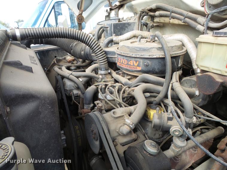 image for item DA9903 1986 Ford F700 digger derrick truck