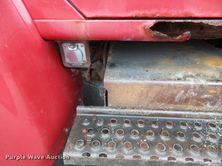 image for item K8136 1999 International 4900 roll-off truck