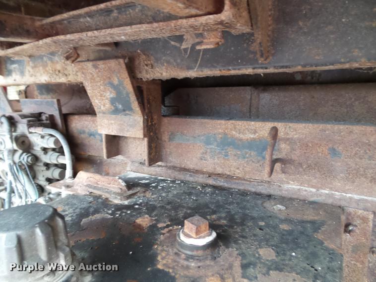 image for item K8136 1999 International 4900 roll-off truck