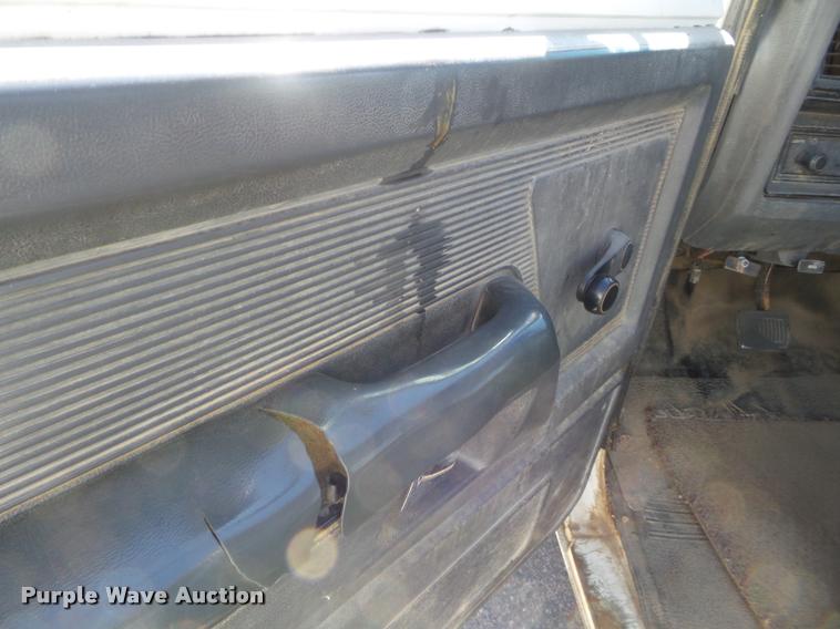 image for item L1678 1993 Dodge D350 flatbed pickup truck