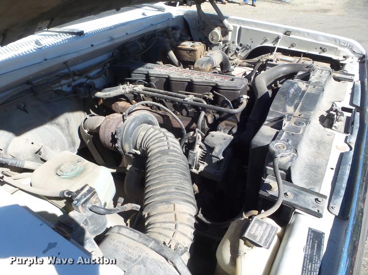 image for item L1678 1993 Dodge D350 flatbed pickup truck