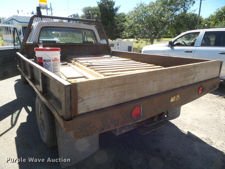 image for item L1678 1993 Dodge D350 flatbed pickup truck