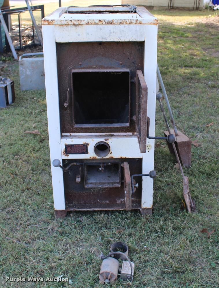 Clayton wood burning stove in Cookson, OK Item AQ9582 sold Purple Wave