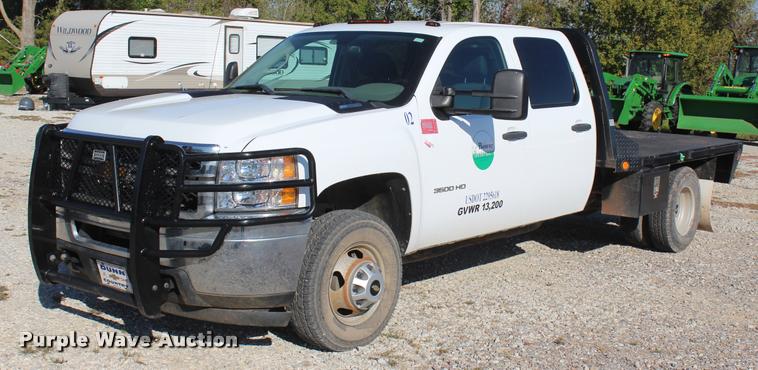 image for item L4828 2012 Chevrolet Silverado 3500HD Crew Cab flatbed pickup truck