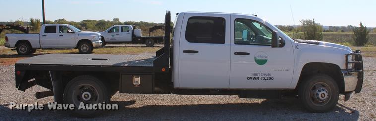 image for item L4828 2012 Chevrolet Silverado 3500HD Crew Cab flatbed pickup truck