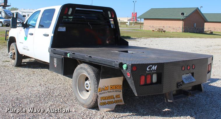 image for item L4828 2012 Chevrolet Silverado 3500HD Crew Cab flatbed pickup truck
