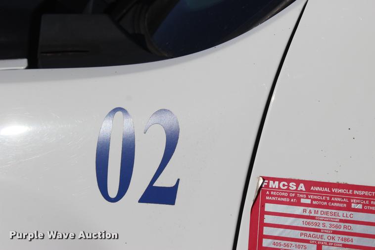 image for item L4828 2012 Chevrolet Silverado 3500HD Crew Cab flatbed pickup truck