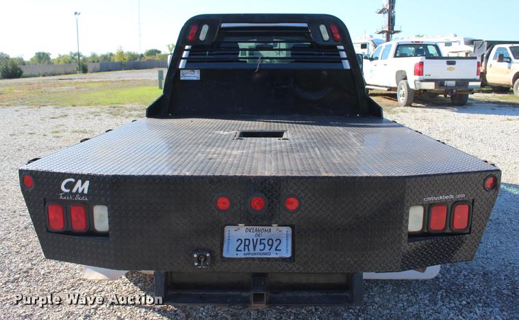 image for item L4828 2012 Chevrolet Silverado 3500HD Crew Cab flatbed pickup truck