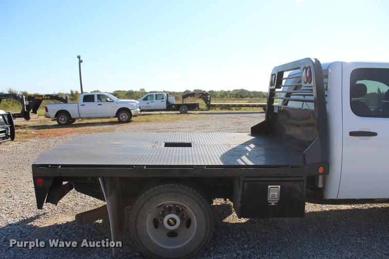 image for item L4828 2012 Chevrolet Silverado 3500HD Crew Cab flatbed pickup truck