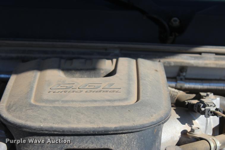 image for item L4828 2012 Chevrolet Silverado 3500HD Crew Cab flatbed pickup truck