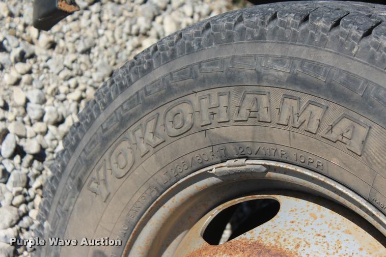 image for item L4828 2012 Chevrolet Silverado 3500HD Crew Cab flatbed pickup truck