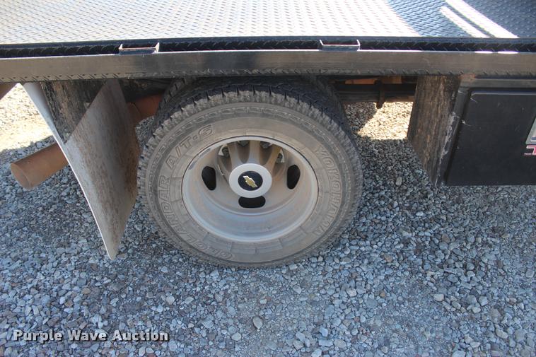 image for item L4828 2012 Chevrolet Silverado 3500HD Crew Cab flatbed pickup truck