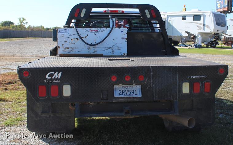 image for item L4829 2011 Chevrolet Silverado 3500HD Crew Cab flatbed pickup truck