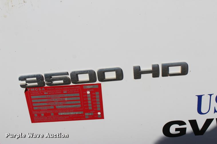 image for item L4829 2011 Chevrolet Silverado 3500HD Crew Cab flatbed pickup truck