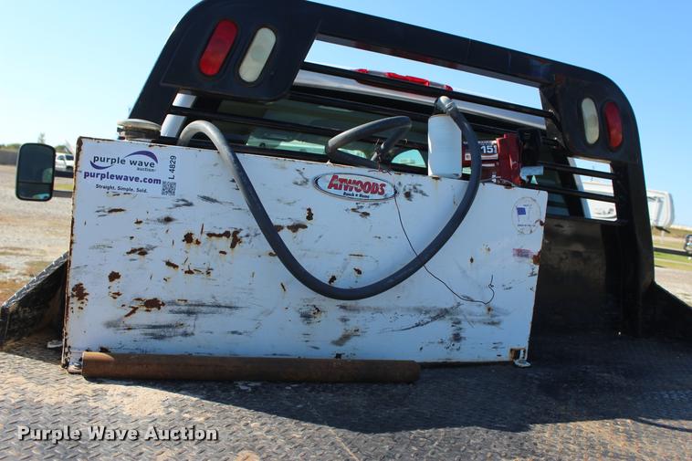 image for item L4829 2011 Chevrolet Silverado 3500HD Crew Cab flatbed pickup truck