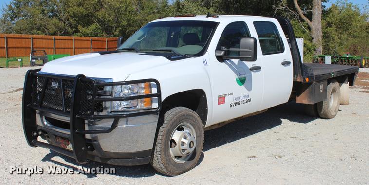 image for item L4835 2012 Chevrolet Silverado 3500HD Crew Cab flatbed pickup truck