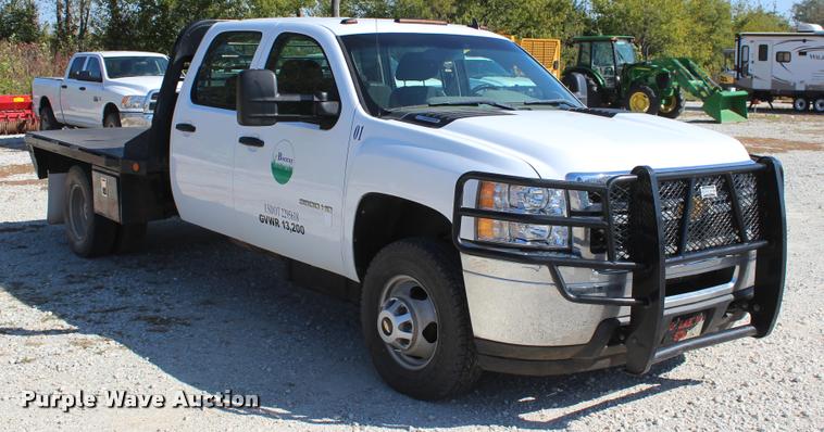 image for item L4835 2012 Chevrolet Silverado 3500HD Crew Cab flatbed pickup truck