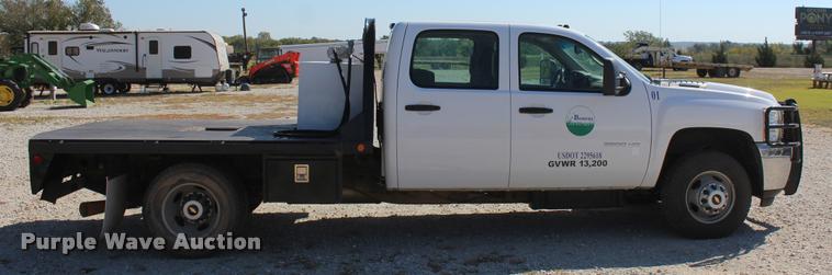 image for item L4835 2012 Chevrolet Silverado 3500HD Crew Cab flatbed pickup truck