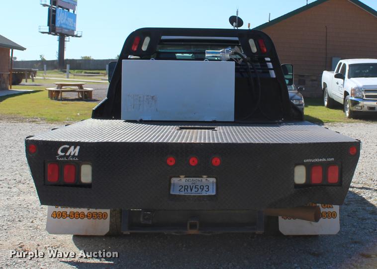 image for item L4835 2012 Chevrolet Silverado 3500HD Crew Cab flatbed pickup truck