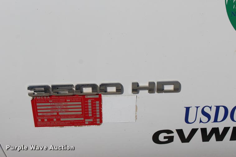 image for item L4835 2012 Chevrolet Silverado 3500HD Crew Cab flatbed pickup truck