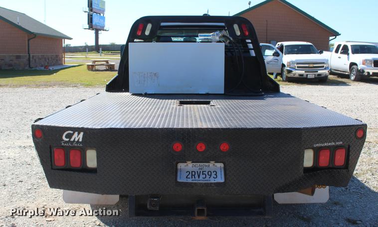 image for item L4835 2012 Chevrolet Silverado 3500HD Crew Cab flatbed pickup truck