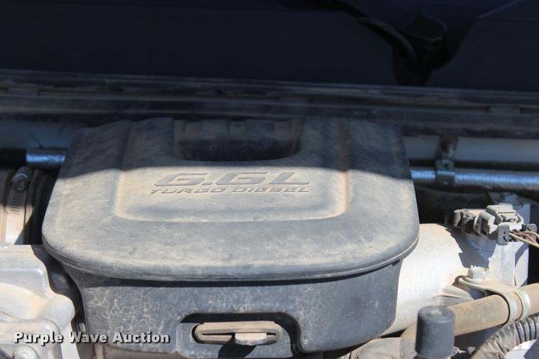 image for item L4835 2012 Chevrolet Silverado 3500HD Crew Cab flatbed pickup truck