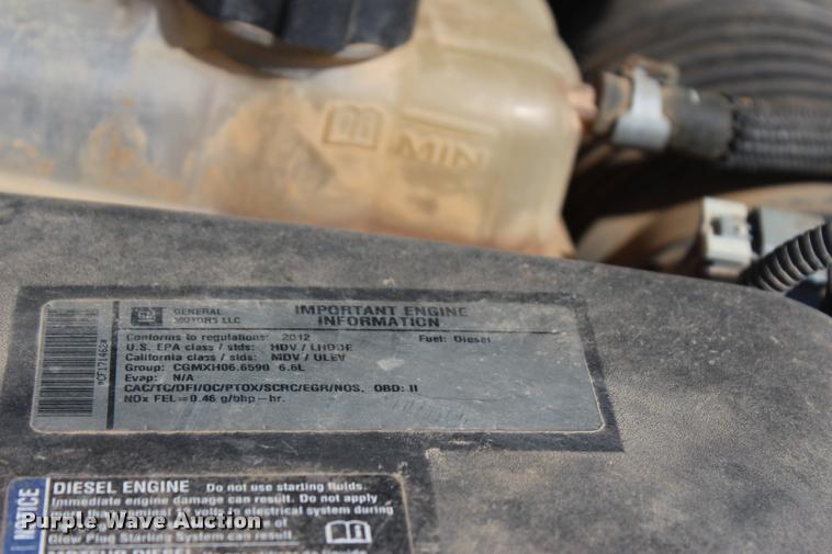 image for item L4835 2012 Chevrolet Silverado 3500HD Crew Cab flatbed pickup truck