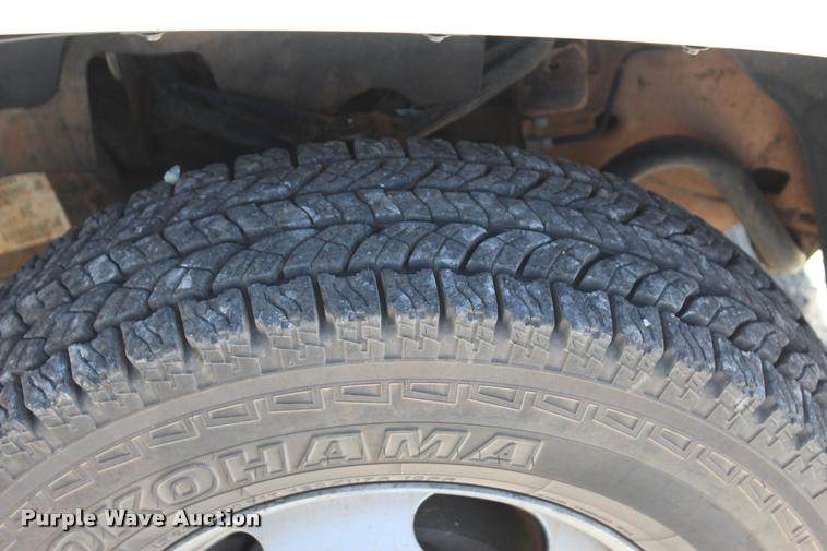 image for item L4835 2012 Chevrolet Silverado 3500HD Crew Cab flatbed pickup truck