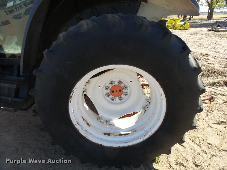 image for item L3353 1999 New Holland TS100 tractor