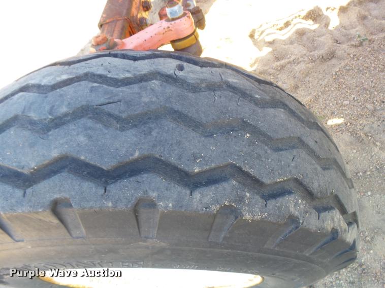 image for item L3353 1999 New Holland TS100 tractor