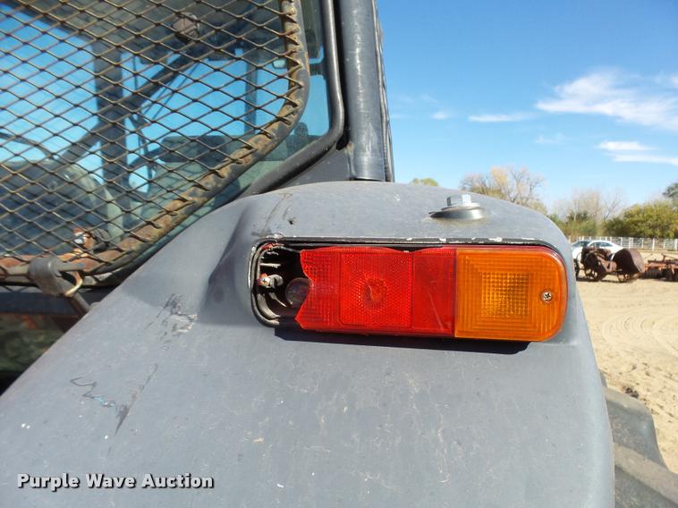 image for item L3353 1999 New Holland TS100 tractor