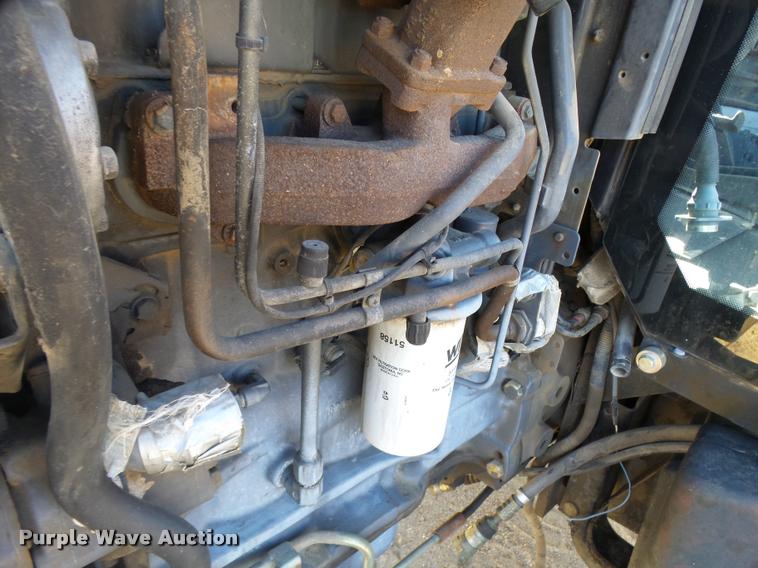 image for item L3355 2002 New Holland TS100 tractor