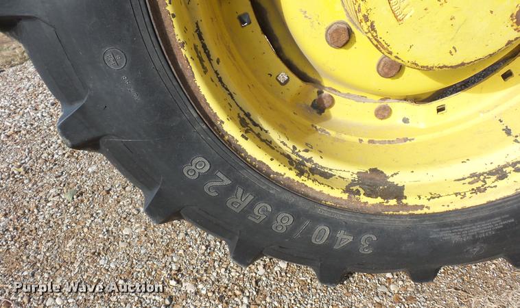 image for item L4371 1994 John Deere 7400 MFWD tractor