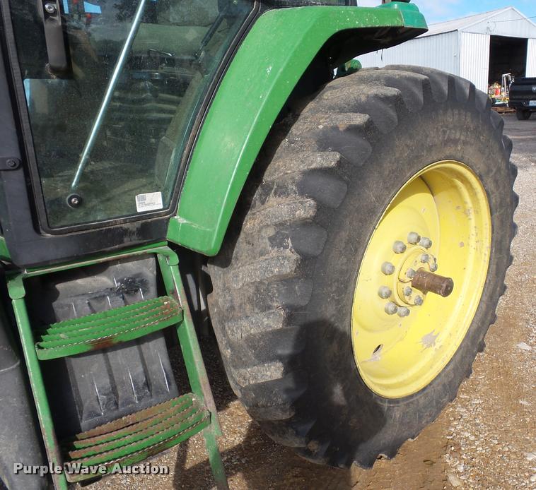 image for item L4371 1994 John Deere 7400 MFWD tractor