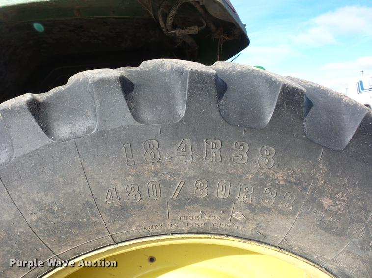 image for item L4371 1994 John Deere 7400 MFWD tractor