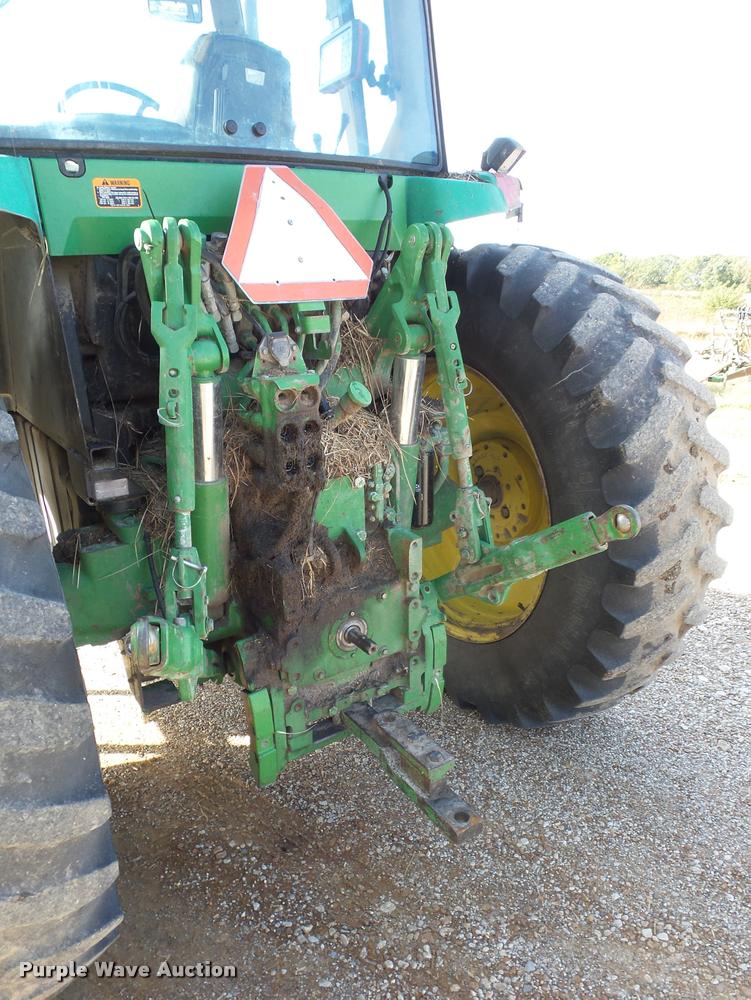 image for item L4371 1994 John Deere 7400 MFWD tractor