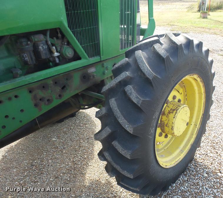 image for item L4371 1994 John Deere 7400 MFWD tractor