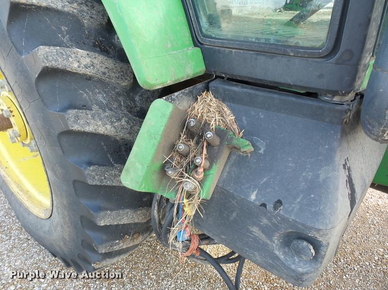 image for item L4371 1994 John Deere 7400 MFWD tractor