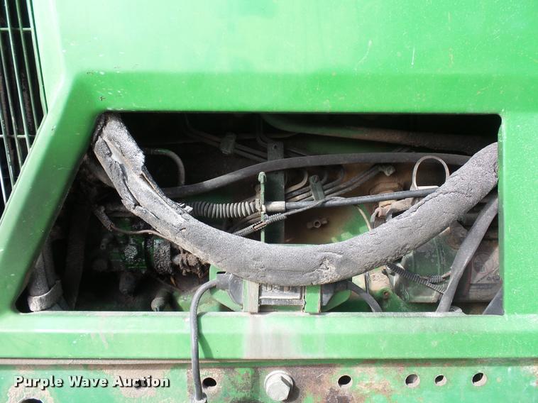 image for item L4371 1994 John Deere 7400 MFWD tractor
