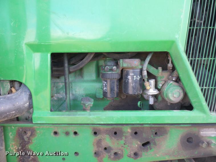 image for item L4371 1994 John Deere 7400 MFWD tractor