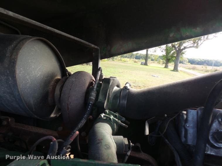 image for item L4371 1994 John Deere 7400 MFWD tractor